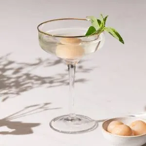 Nut-Free Shellfish-Free White Lotus-Inspired Lychee and Thai Basil Martini Recipe — World recipe